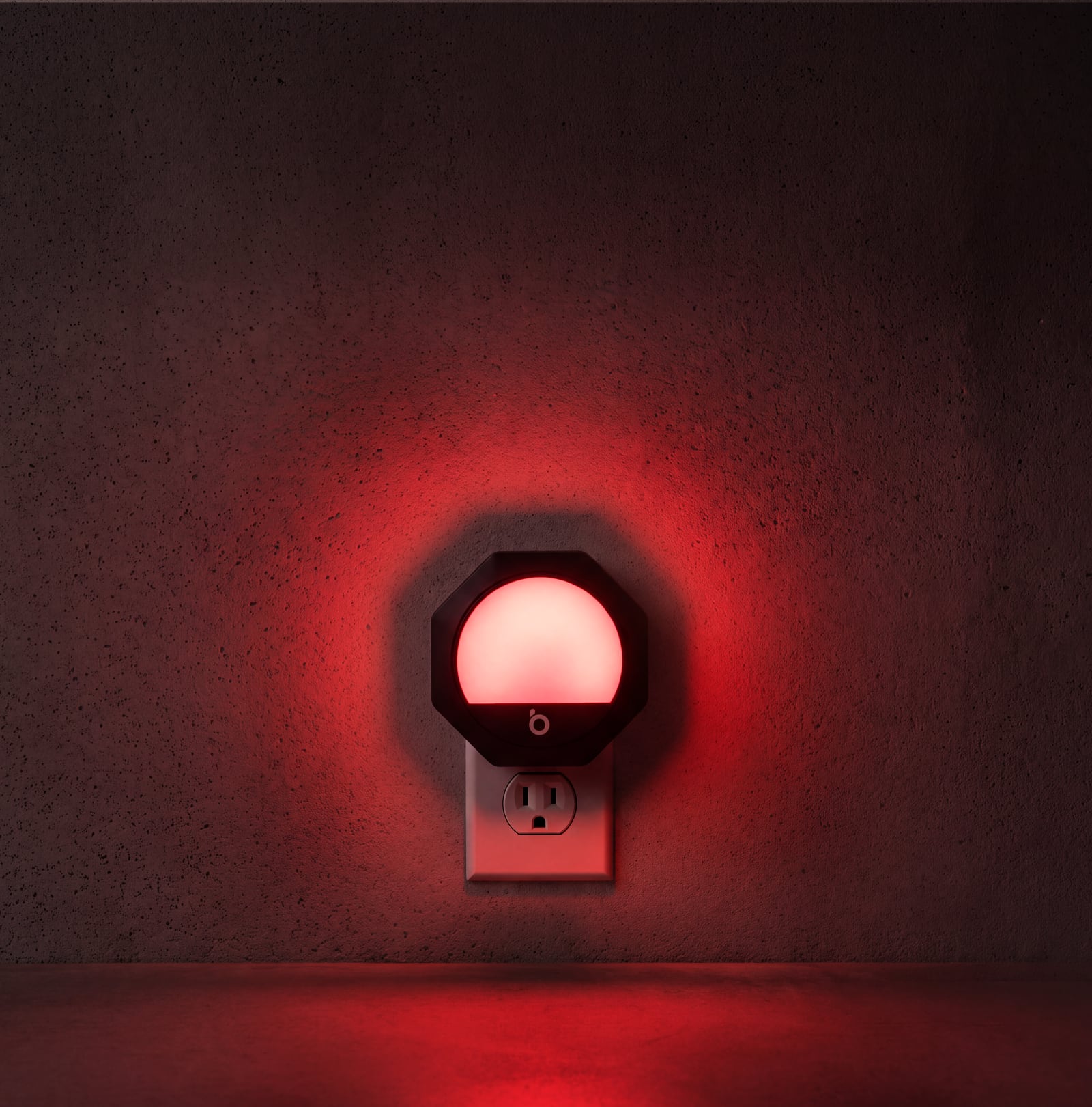 Night light plugged into a wall socket