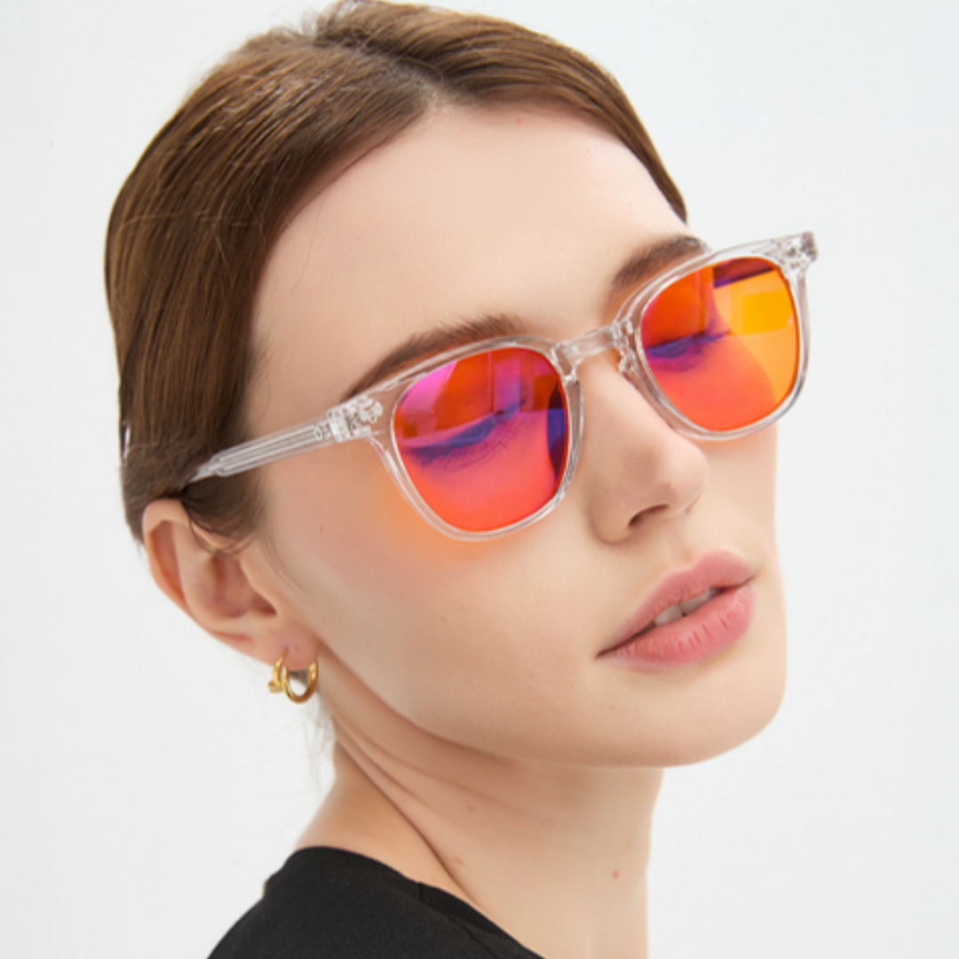 Portrait wearing Newton Crystal glasses, orange lenses